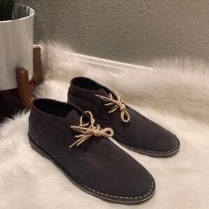 Men polo boots and suede shoes